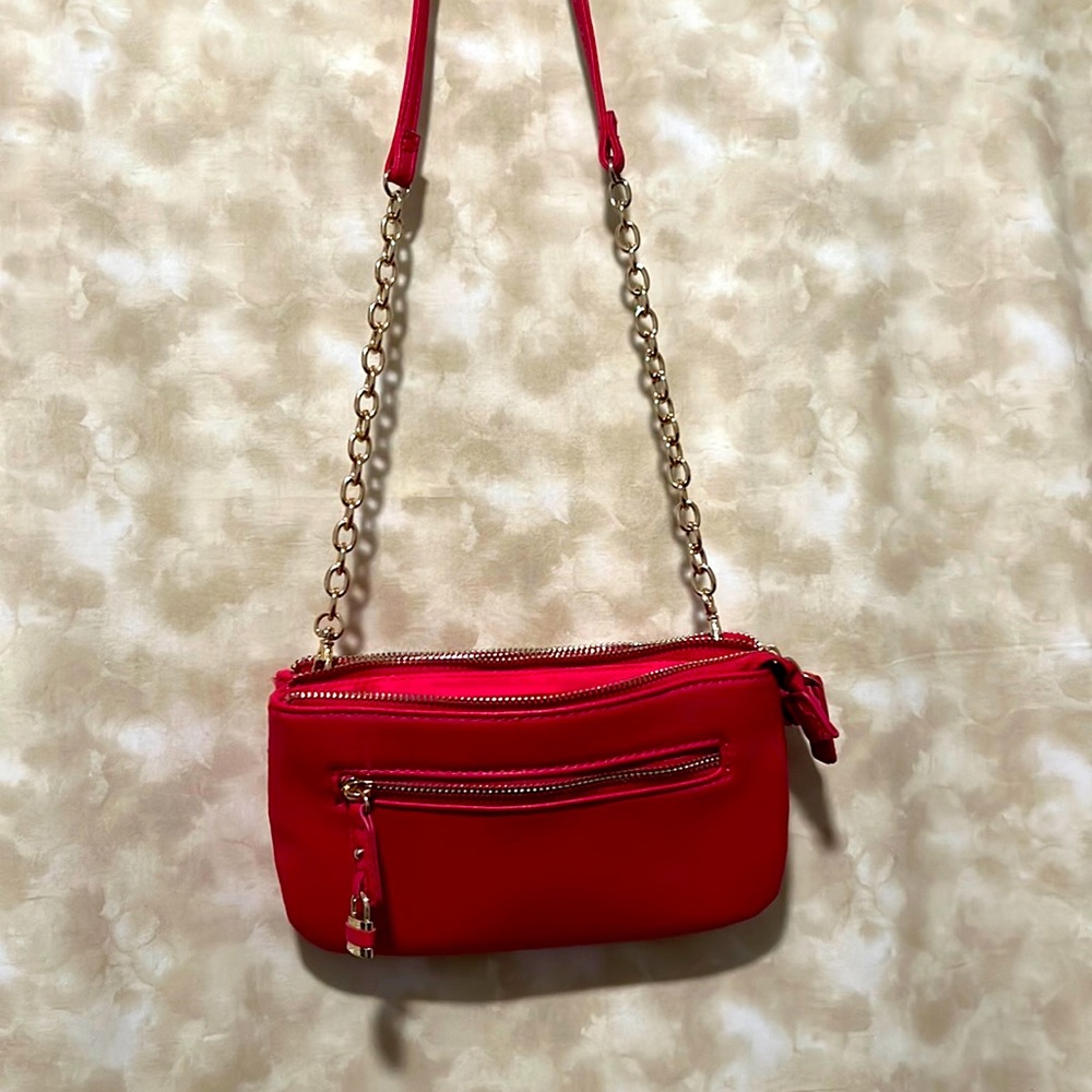 Charming Charlie purse. Double sided openings. Inside pockets. Spacious and cute